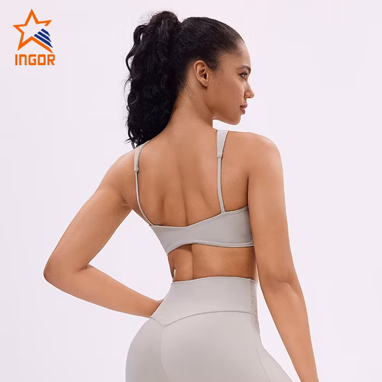 OEM ODM Unique Design Women Gym Fashionable Wholesale Fitness Clothing Manufaturer Custom Hollow out Sports Pearl Fabric Yoga Bra